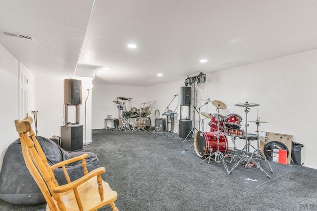 exercise room featuring visible vents and recessed lighting