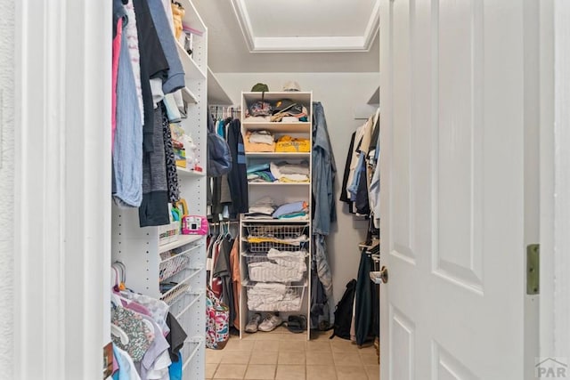 walk in closet featuring light tile patterned floors