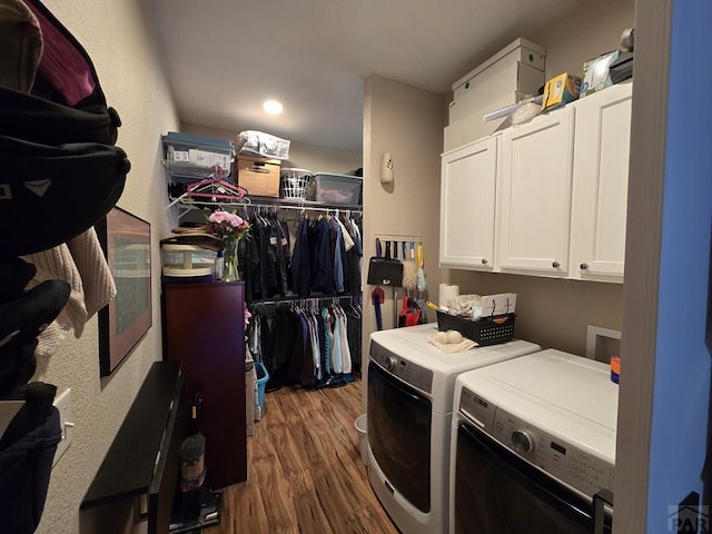 6190 Douglas Way, Colorado City, CO 81019 - washroom featuring cabinet space, dark wood finished floors, and washing machine and dryer