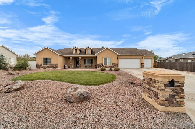 ranch-style house with a garage, concrete driveway, stone siding, fence, and stucco siding