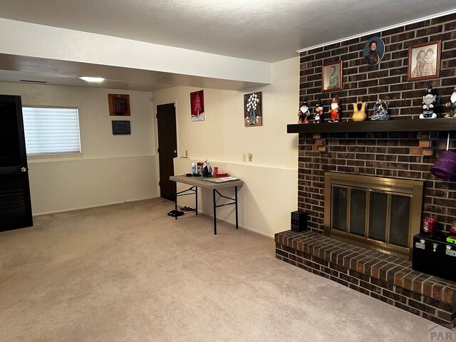 living area featuring light carpet and a brick fireplace