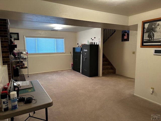 interior space featuring carpet and baseboards