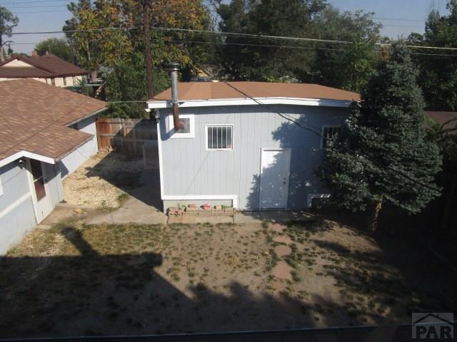 view of outdoor structure with fence