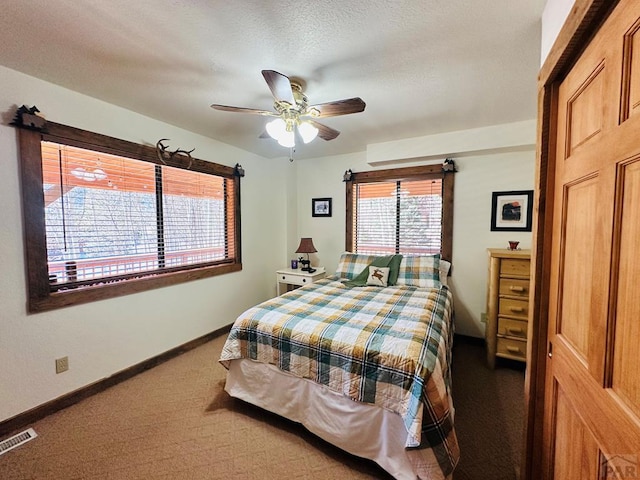 834 Ponderosa Rd, Cuchara, CO 81055 - bedroom featuring light colored carpet, baseboards, and a ceiling fan