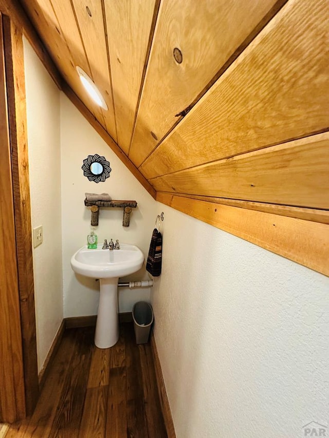 834 Ponderosa Rd, Cuchara, CO 81055 - bathroom featuring vaulted ceiling, wood finished floors, and baseboards