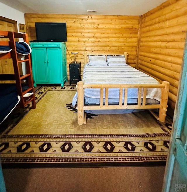 834 Ponderosa Rd, Cuchara, CO 81055 - bedroom featuring rustic walls