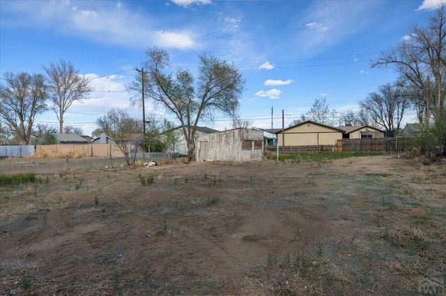 view of yard with fence