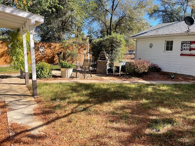 view of yard with fence