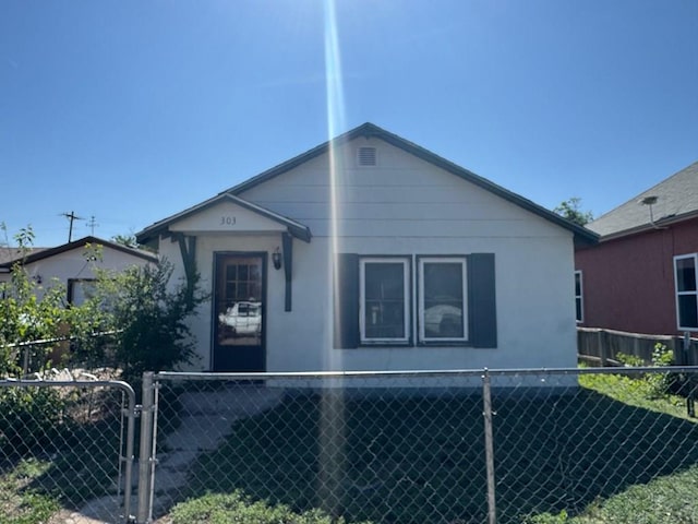 303 8th St, Fowler, CO 81039 - view of front facade with a gate