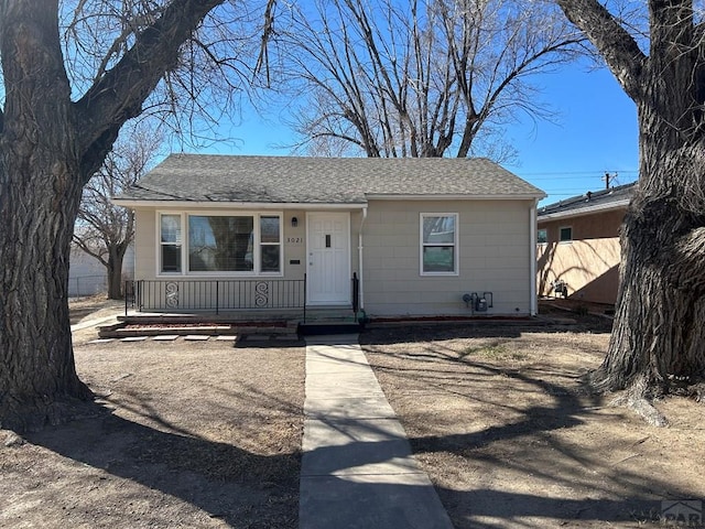 view of front of house featuring a shingled roof