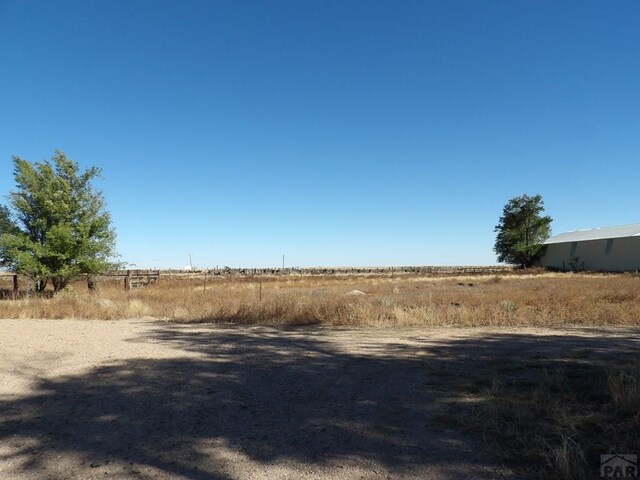 exterior space with a rural view