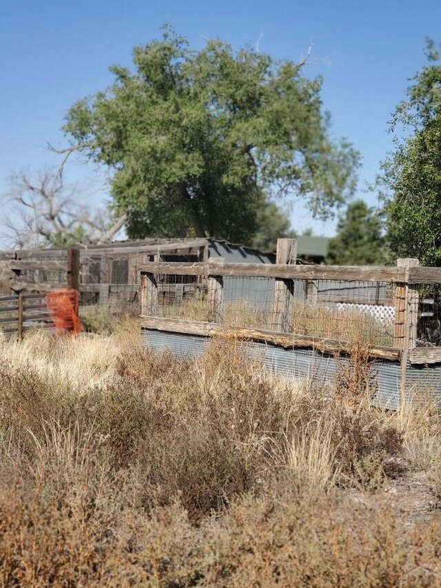 community sign with fence