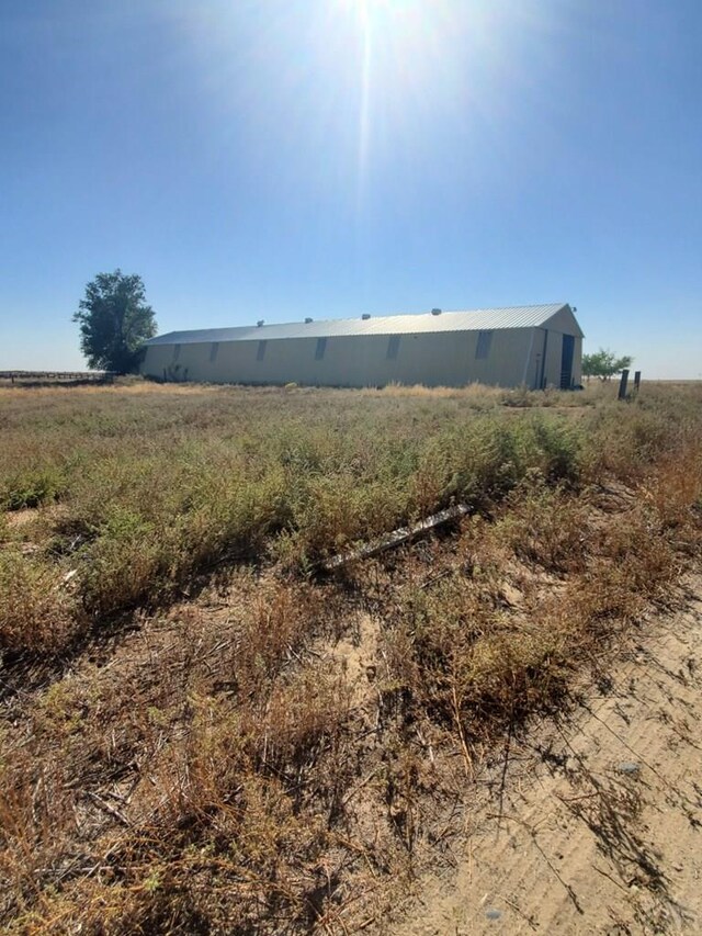 exterior space with a rural view