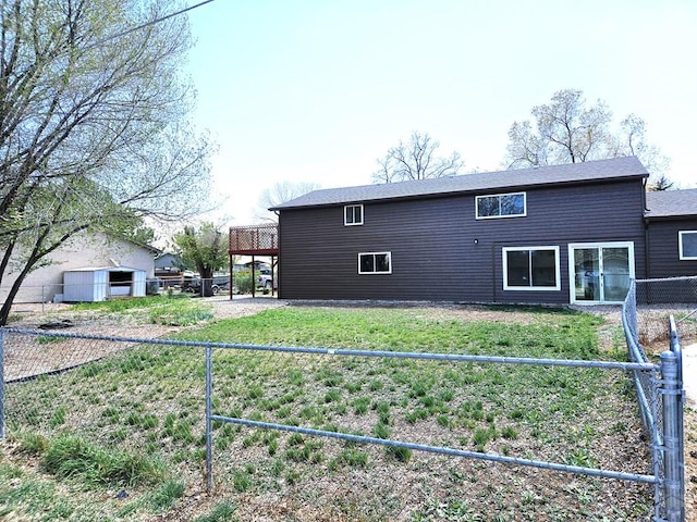 802 E 5th St, Florence, CO 81226 - rear view of property featuring a fenced backyard and a lawn