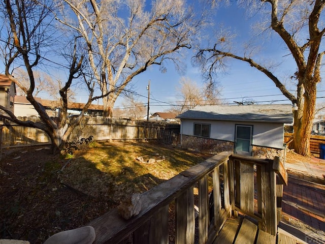 exterior space featuring a fenced backyard and a yard