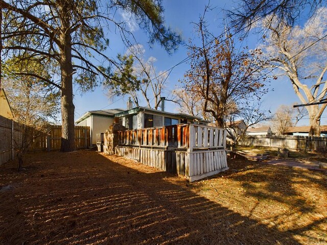 exterior space featuring a fenced backyard