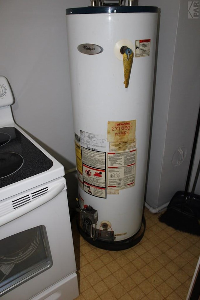 utility room with water heater