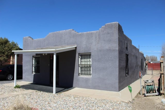 view of home's exterior featuring stucco siding