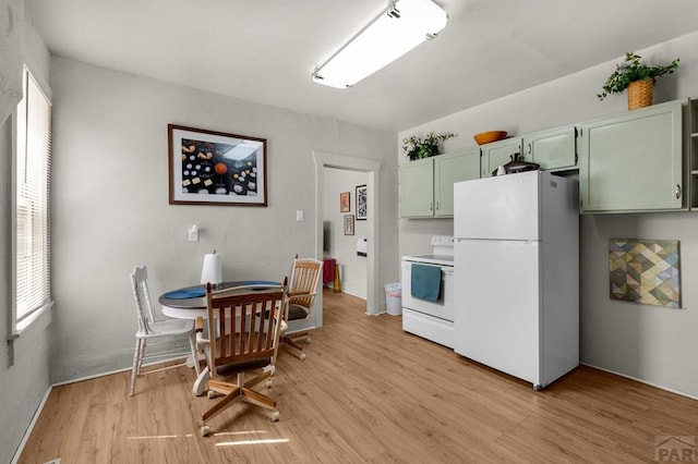 dining room featuring light wood-style flooring