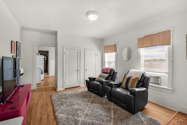 living area with wood finished floors