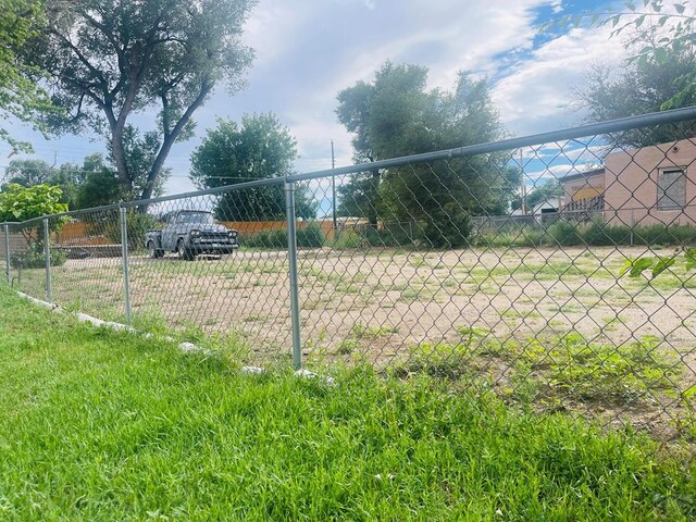 surrounding community featuring fence