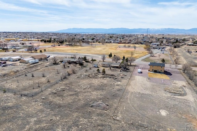 birds eye view of property with a rural view and a mountain view