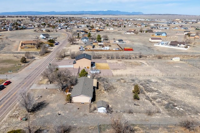 aerial view with a desert view and a mountain view