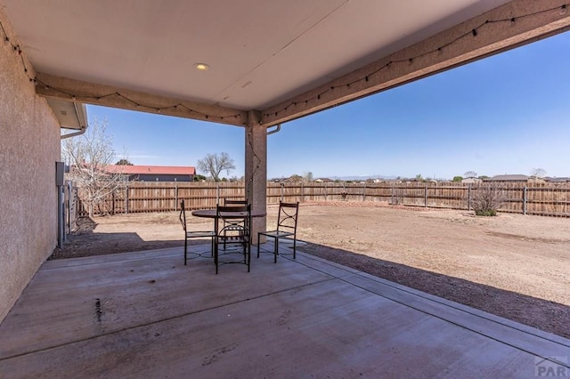 view of patio with a fenced backyard