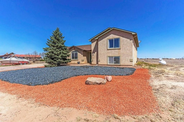 view of front of house with stucco siding