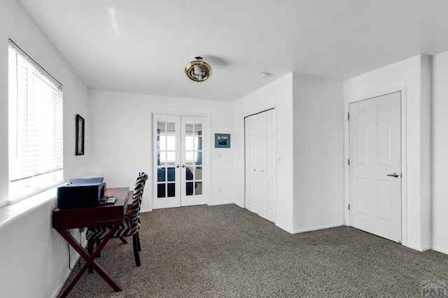 home office featuring baseboards, french doors, and carpet