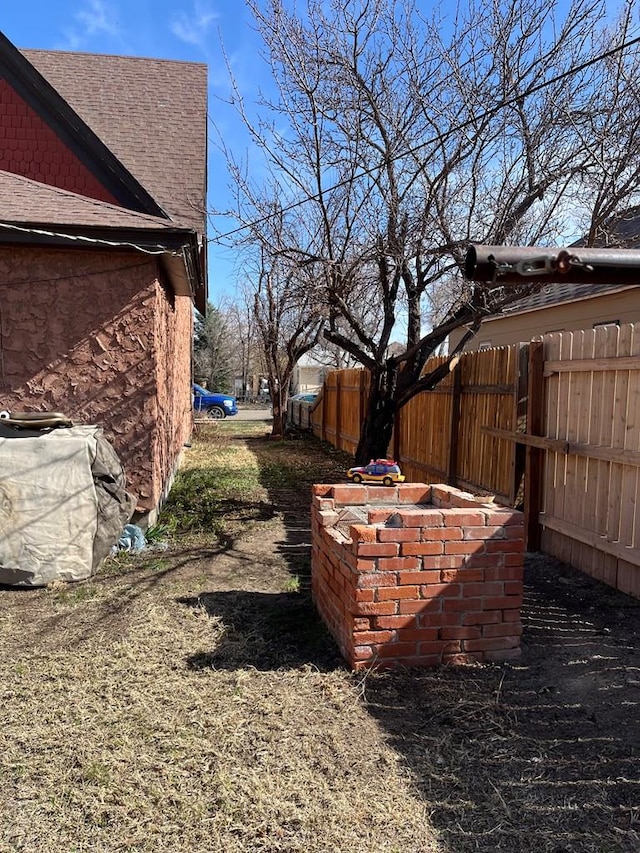 view of yard with fence