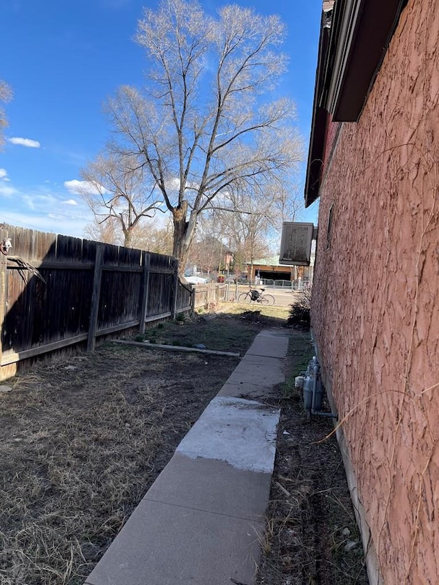 view of yard featuring fence