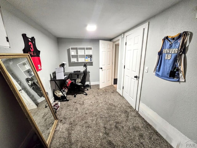 home office featuring carpet flooring and baseboards