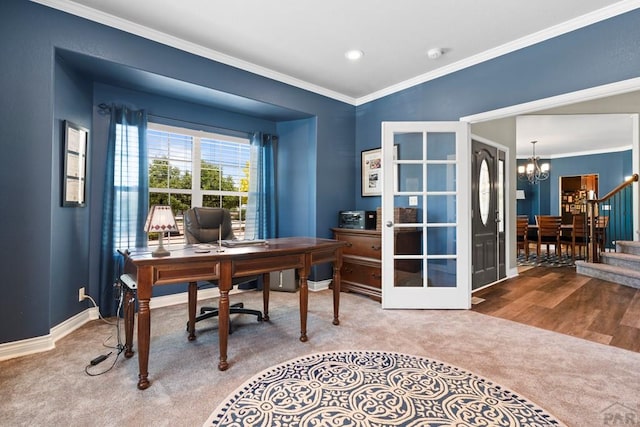 office with an inviting chandelier, baseboards, ornamental molding, and carpet