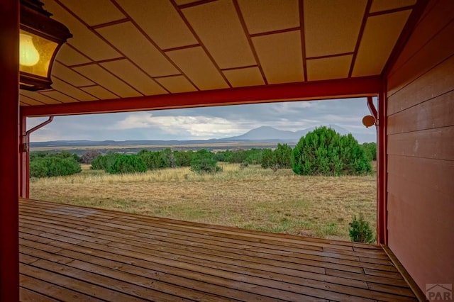 deck with a mountain view and a rural view