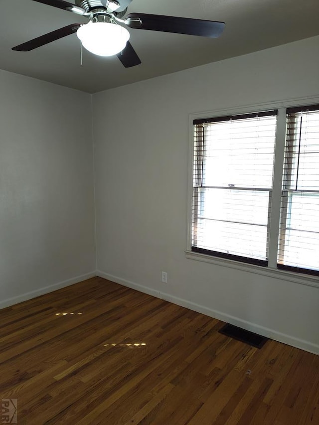 726 W Corona Ave, Pueblo, CO 81004 - empty room featuring wood finished floors, ceiling fan, and baseboards