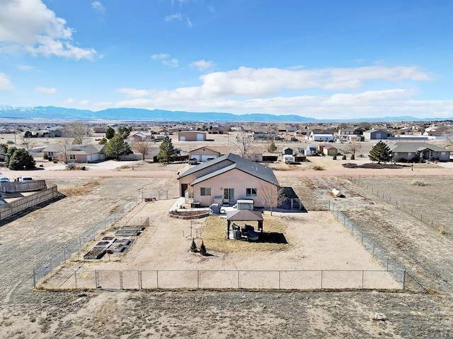 bird's eye view featuring a residential view and a mountain view