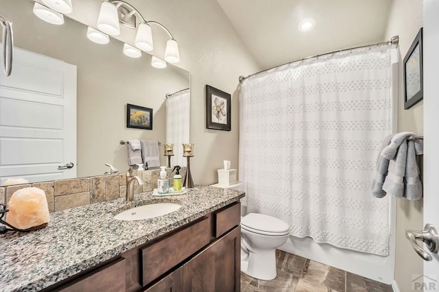 full bath with toilet, shower / bathtub combination with curtain, and vanity