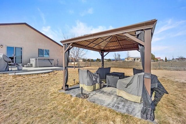 view of yard with a patio area, fence, and a gazebo