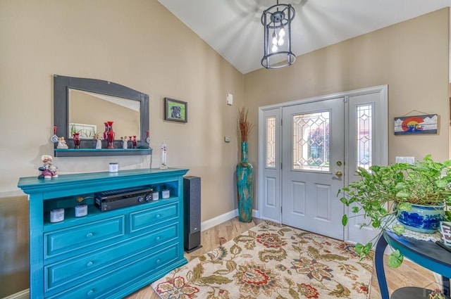 entrance foyer with light wood-style flooring and baseboards