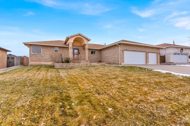 single story home featuring a garage, brick siding, fence, concrete driveway, and a front lawn