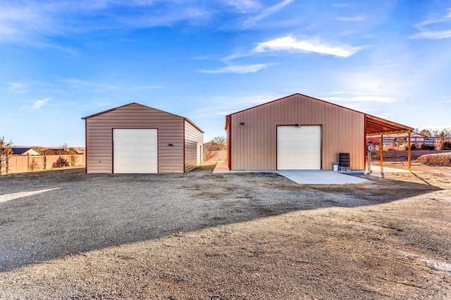 detached garage with fence