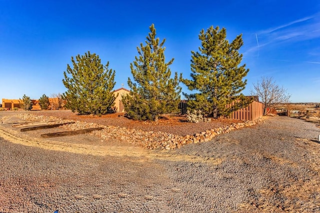 view of yard with fence