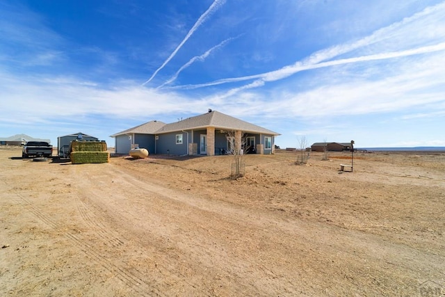 view of front of home featuring a garage and driveway