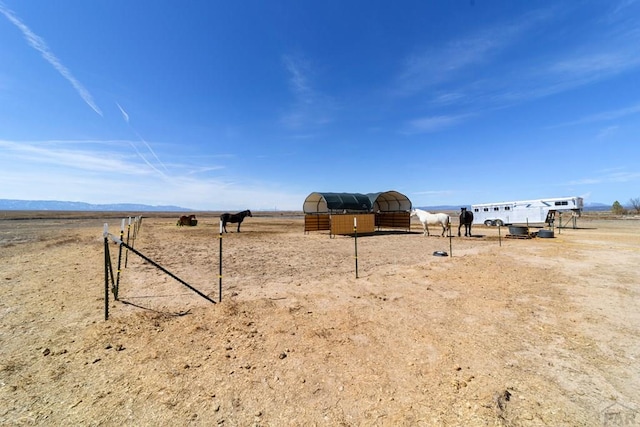 view of yard featuring a rural view