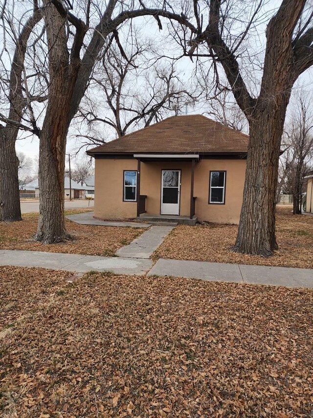 view of front of house featuring stucco siding