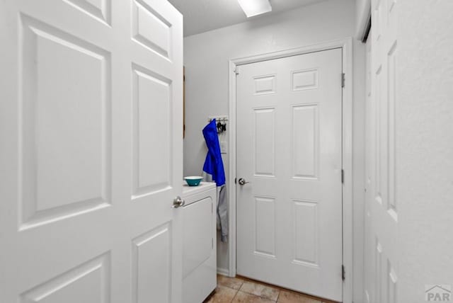 doorway featuring washer / clothes dryer