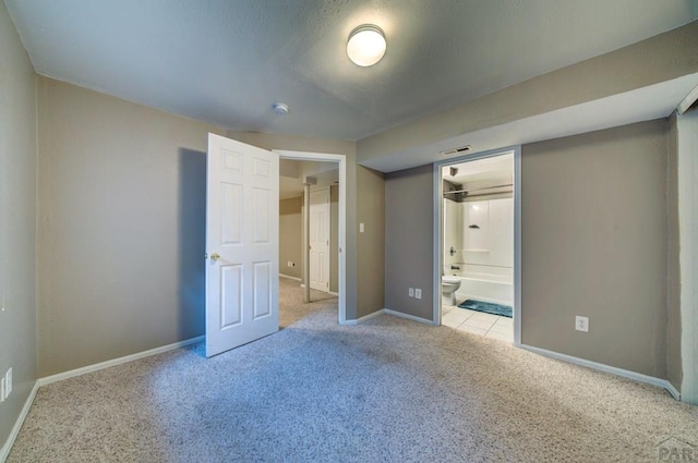 6292 Riverdale Dr, Colorado Springs, CO 80923 - unfurnished bedroom featuring carpet floors and connected bathroom