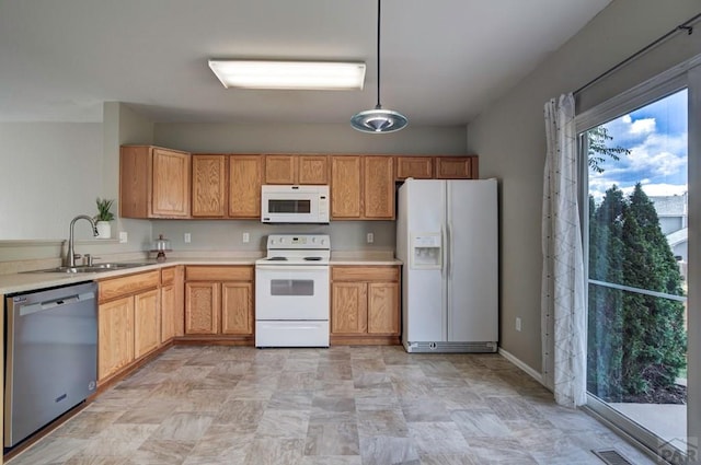 6292 Riverdale Dr, Colorado Springs, CO 80923 - kitchen with white appliances and light countertops