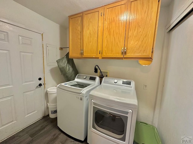 2 Kincaid Dr, Swink, CO 81077 - laundry area featuring cabinet space, washer and clothes dryer, and dark wood-type flooring